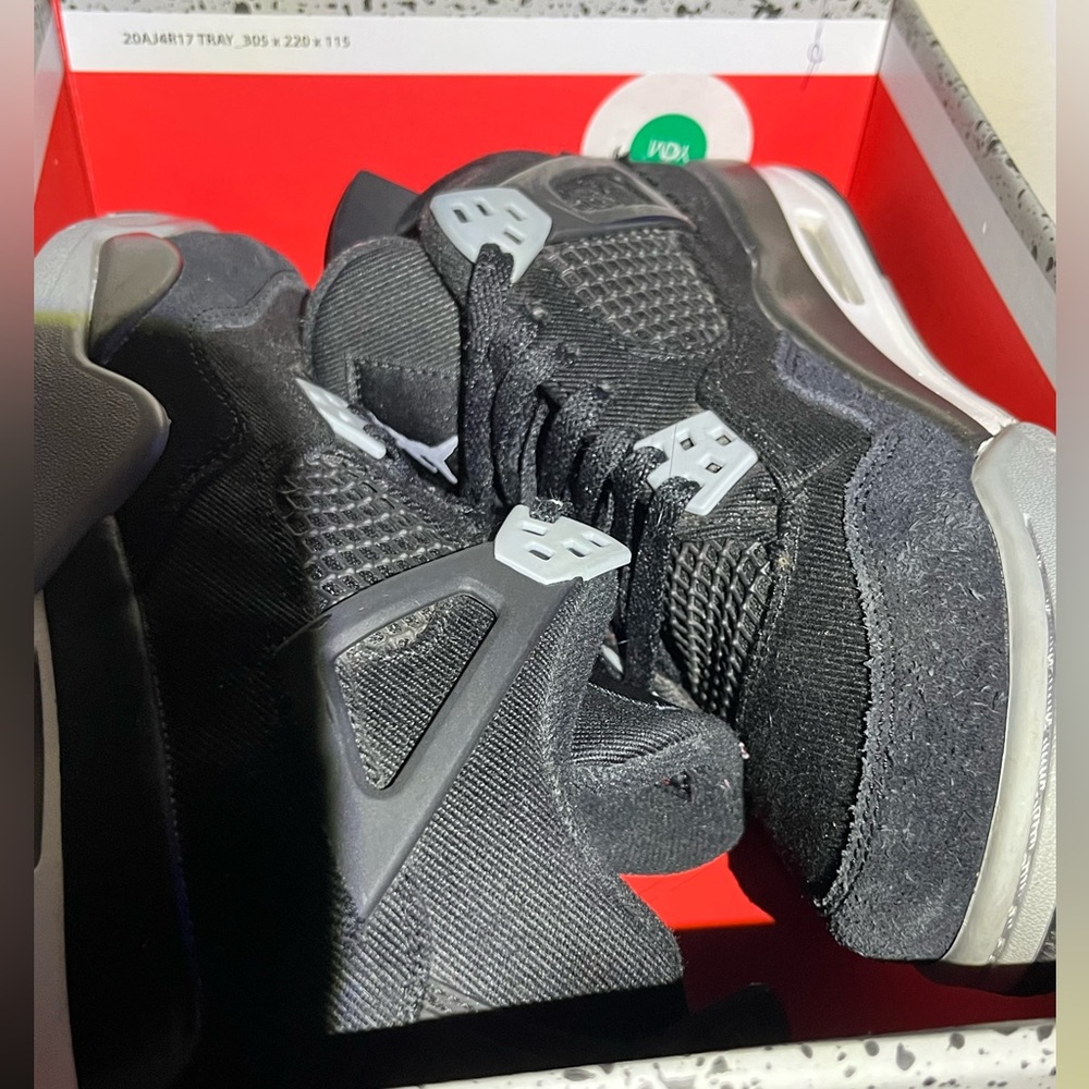 Black Canvas Jordan 4s